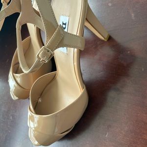 Nude strappy heels by Dune